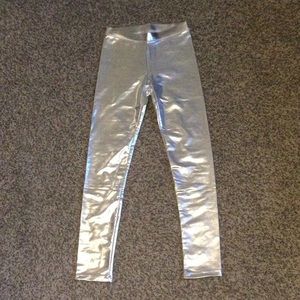 Metallic silver leggings.